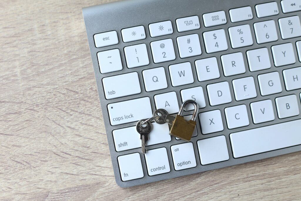 Padlock on computer keyboard, symbol of cyber security